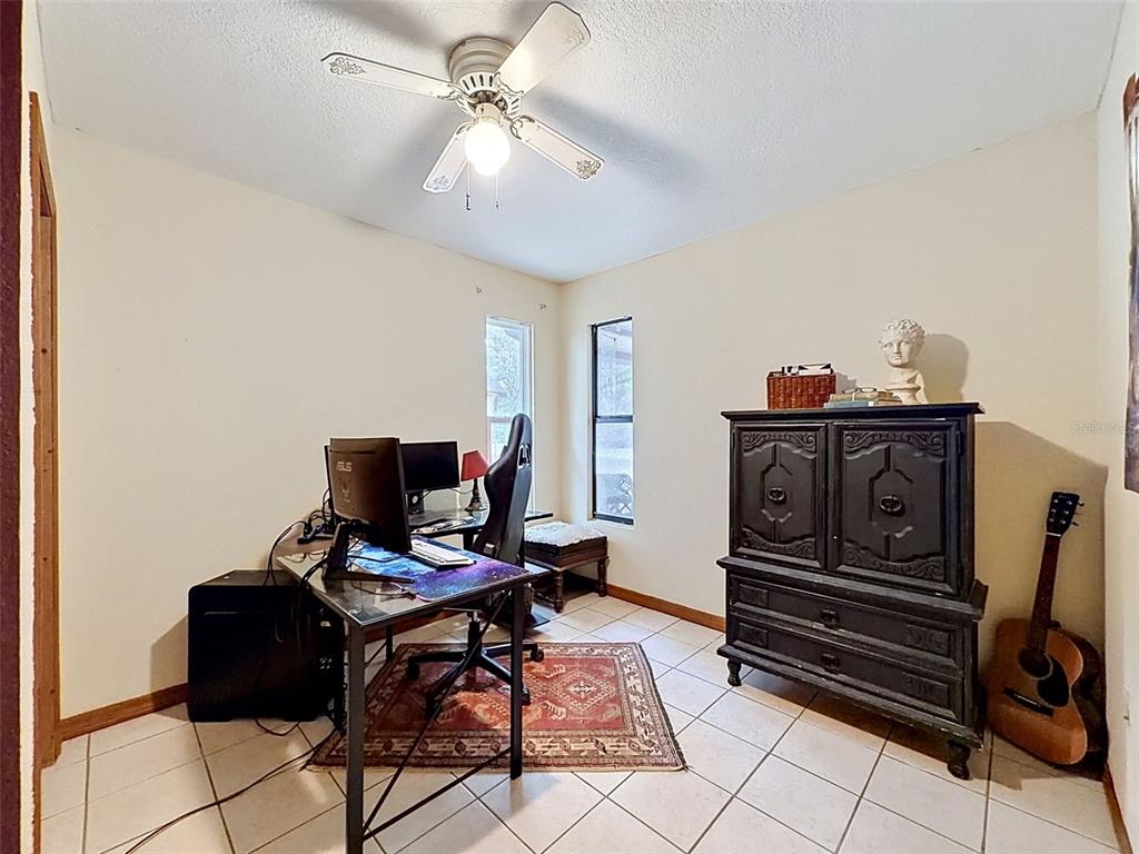 7111 Ricker Avenue Webster, FL 33597 - Photo 29 of 41 a view of a workspace with furniture