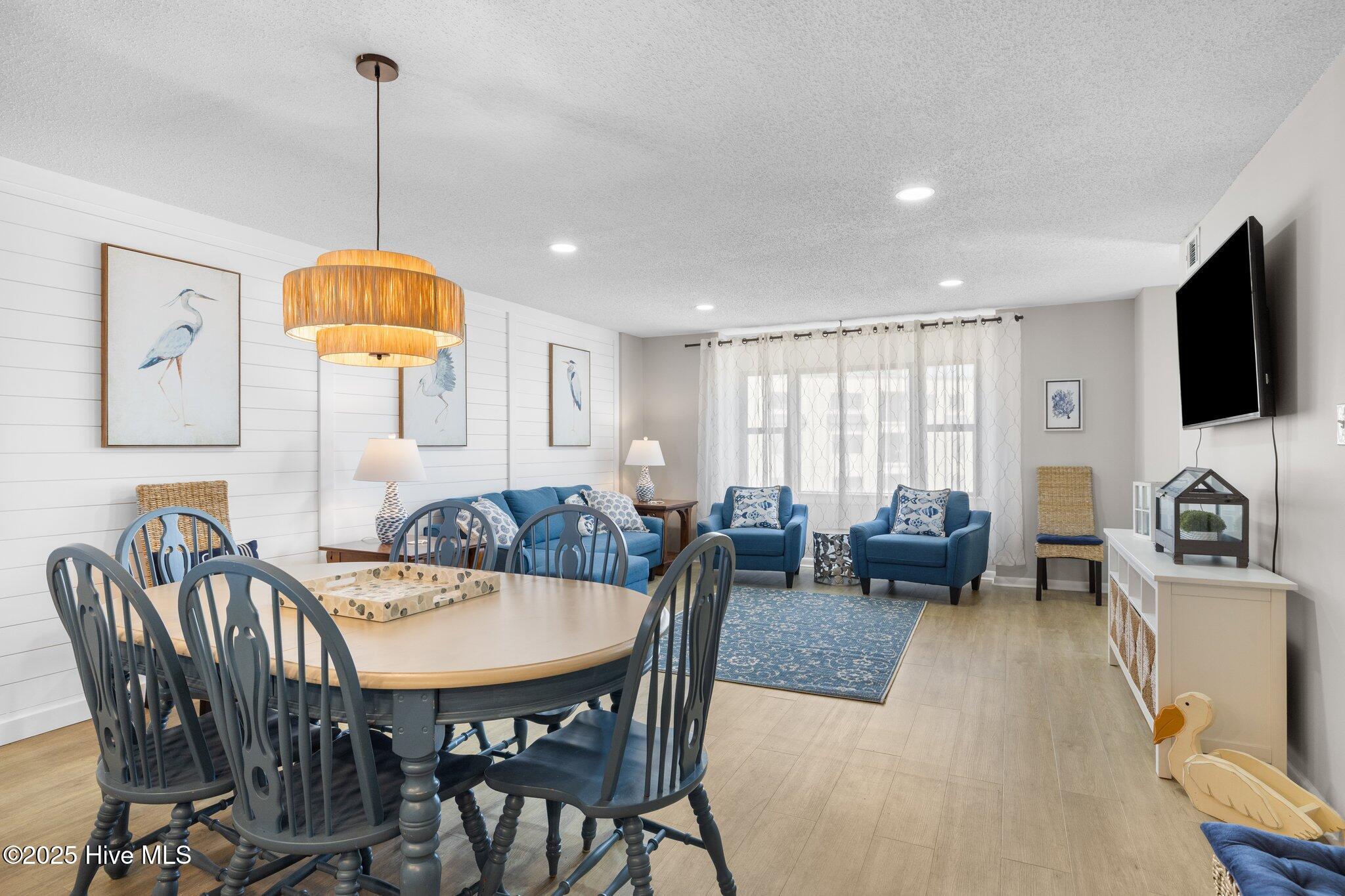 1505 Salter Path Road, Unit 409 Indian Beach, NC 28512 - Photo 9 of 35 Dining and Living Space