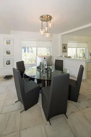 a living room with furniture and window