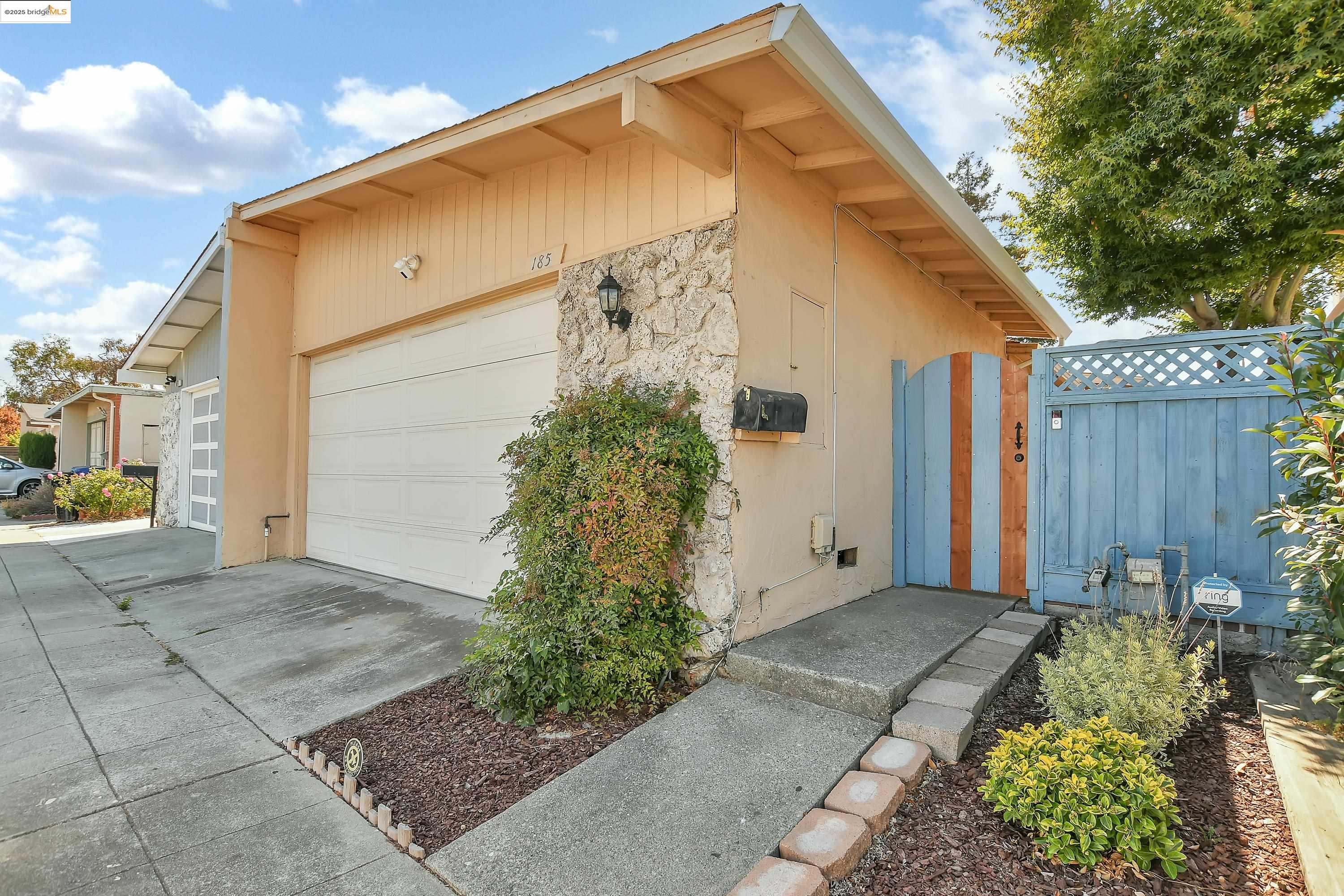 185 Evening Star Court Milpitas, CA 95035 - Photo 12 of 33 a front view of a house with garden