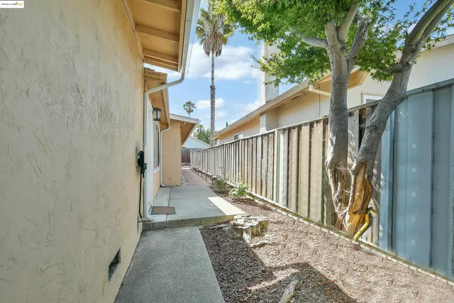 a view of a pathway of a house with wooden floor