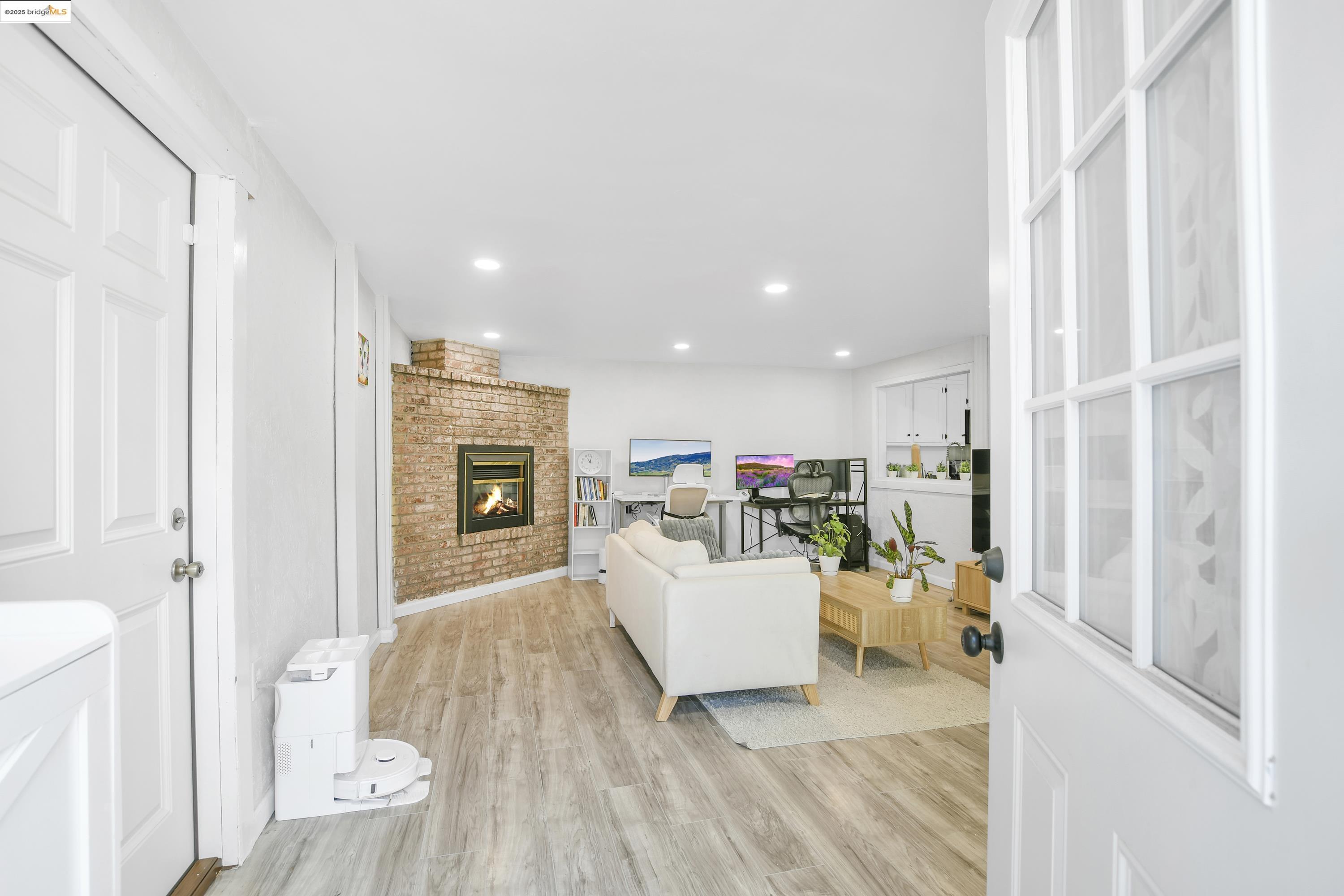 185 Evening Star Court Milpitas, CA 95035 - Photo 16 of 33 a living room with furniture and a wooden floor