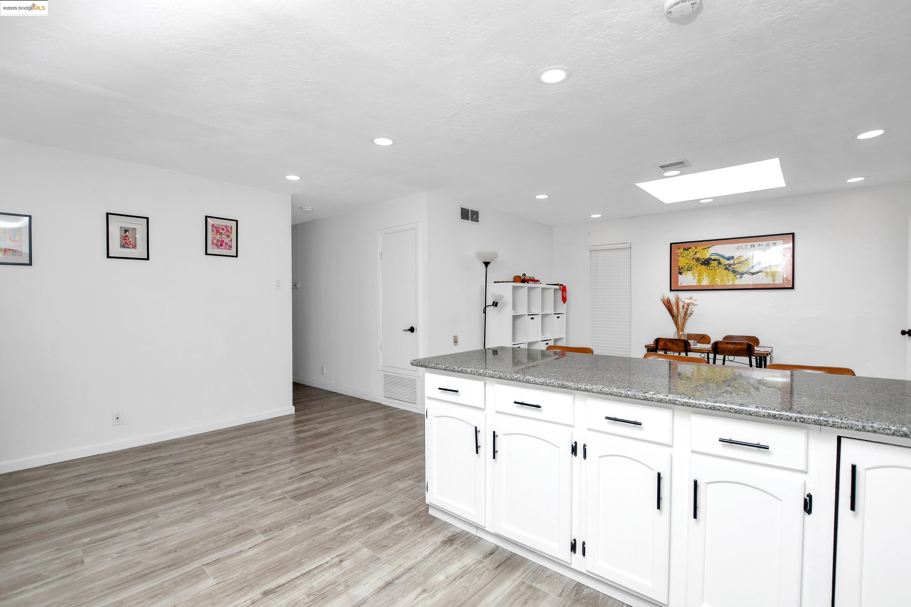 185 Evening Star Court Milpitas, CA 95035 - Photo 23 of 33 a kitchen with a sink and cabinets