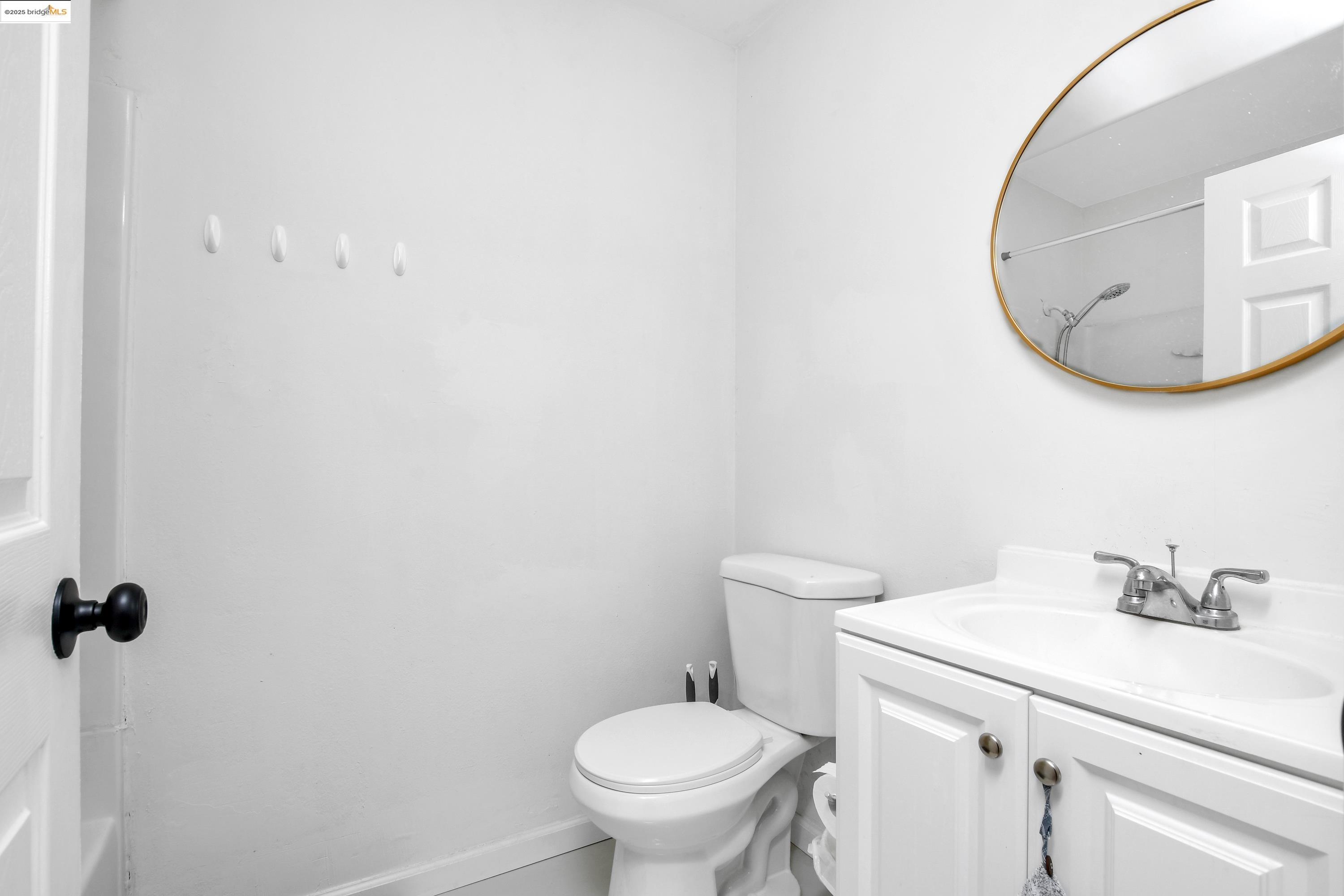 185 Evening Star Court Milpitas, CA 95035 - Photo 25 of 33 a bathroom with a sink and a mirror