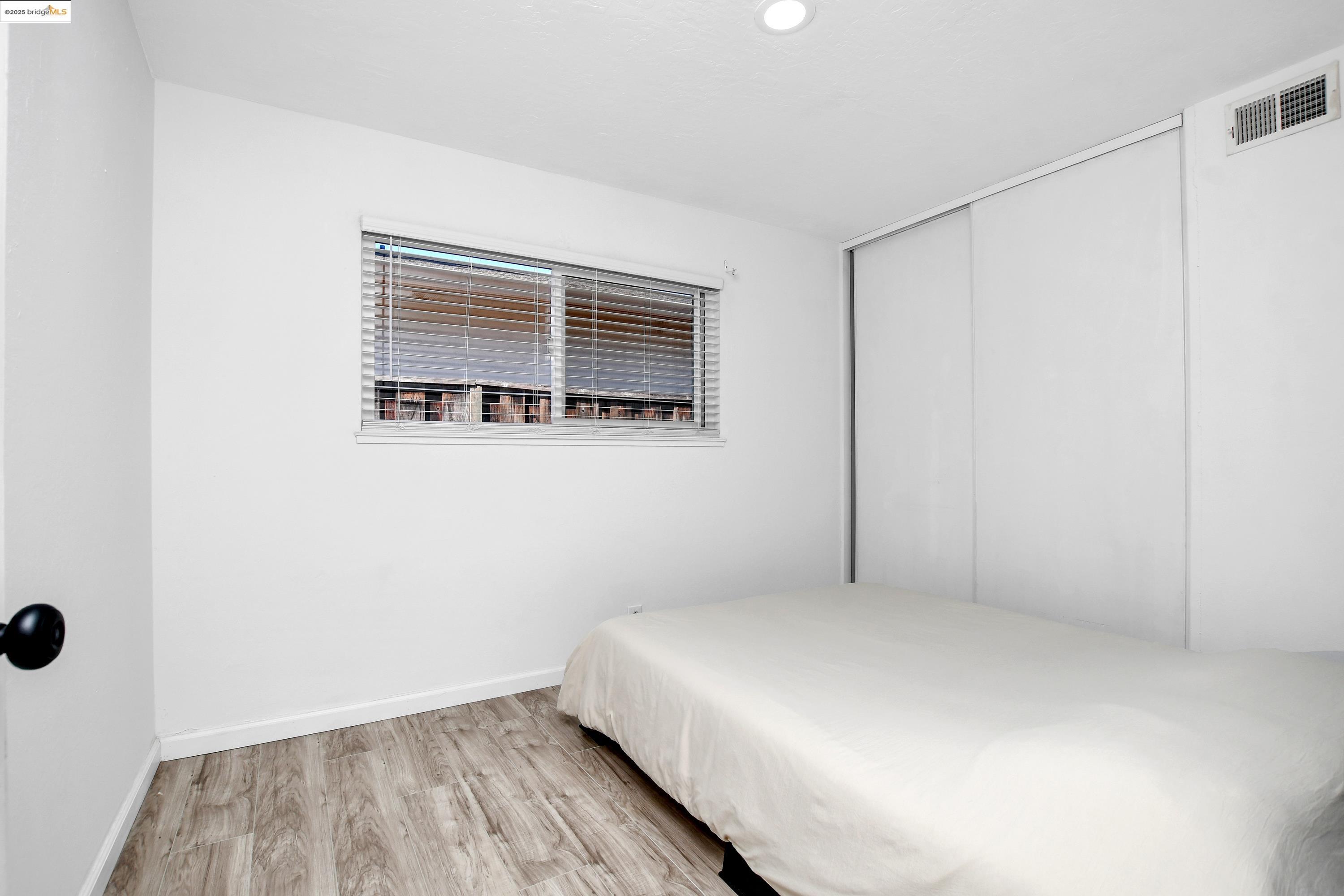 185 Evening Star Court Milpitas, CA 95035 - Photo 26 of 33 a room with a bed and a window