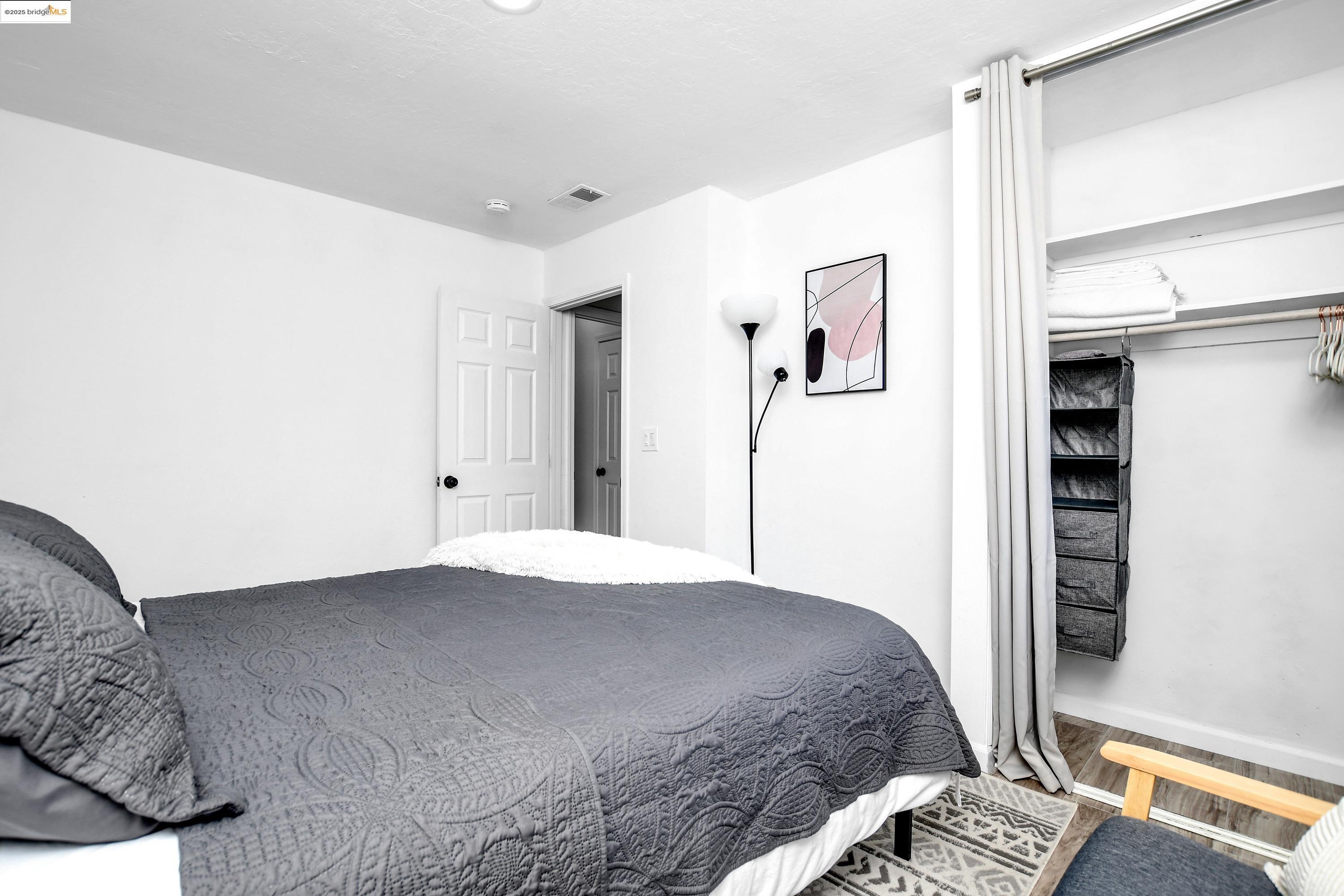 185 Evening Star Court Milpitas, CA 95035 - Photo 29 of 33 a bedroom with a bed and a window