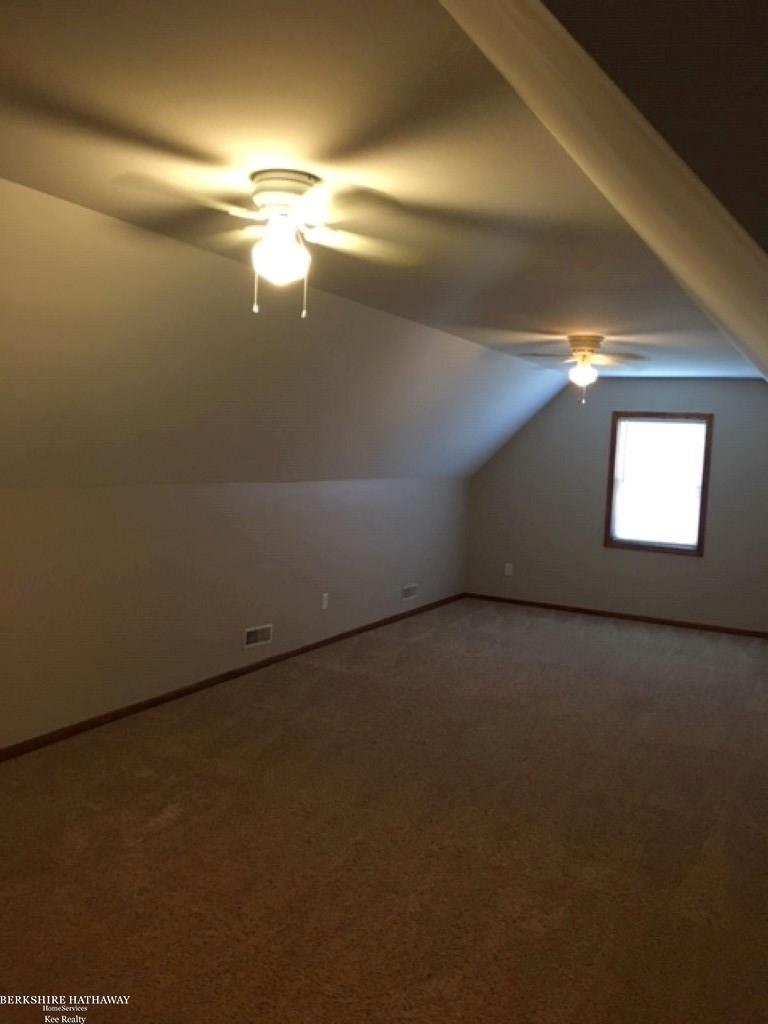 858 Kinney Road Memphis, MI 48041 - Photo 33 of 36 Supersized room! 30'x13' Could be used as 4th bedroom, media room or your inside custom workspace!