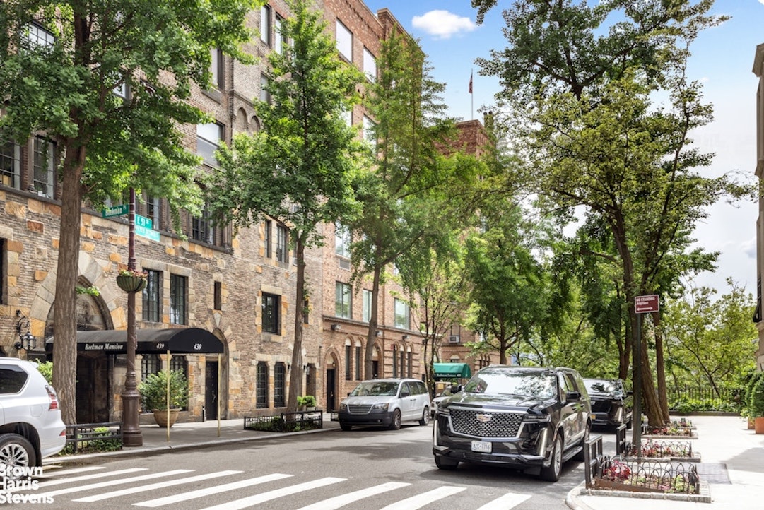 433 East 51st Street, Unit 9A Manhattan, NY 10022 - Photo 13 of 19 a car parked on the side of a street