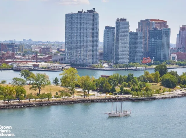 a view of a city with tall buildings