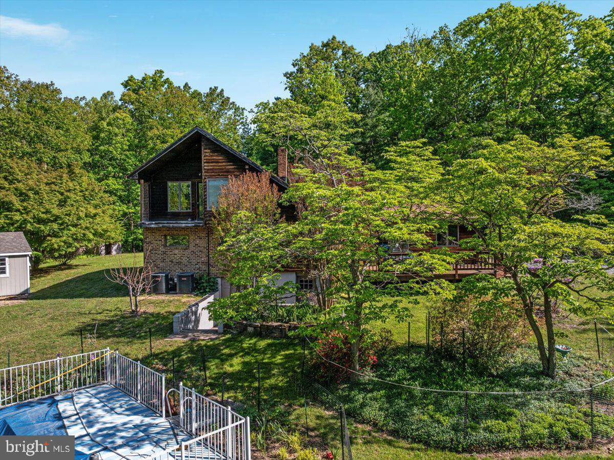 146 Lizzie Mills Road Castleton, VA 22716 - Photo 75 of 91 a view of backyard with a garden and entertaining space