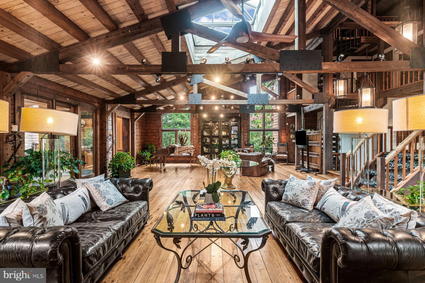 1408 Rene Road Villanova, PA 19085 - Photo 18 of 66 a view of a patio with couches table and chairs and potted plants