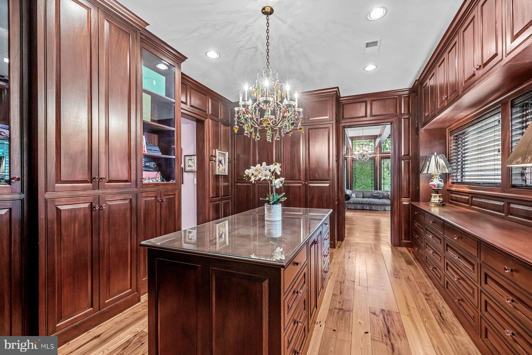 1408 Rene Road Villanova, PA 19085 - Photo 28 of 66 a kitchen with stainless steel appliances granite countertop a refrigerator a stove and a wooden floors
