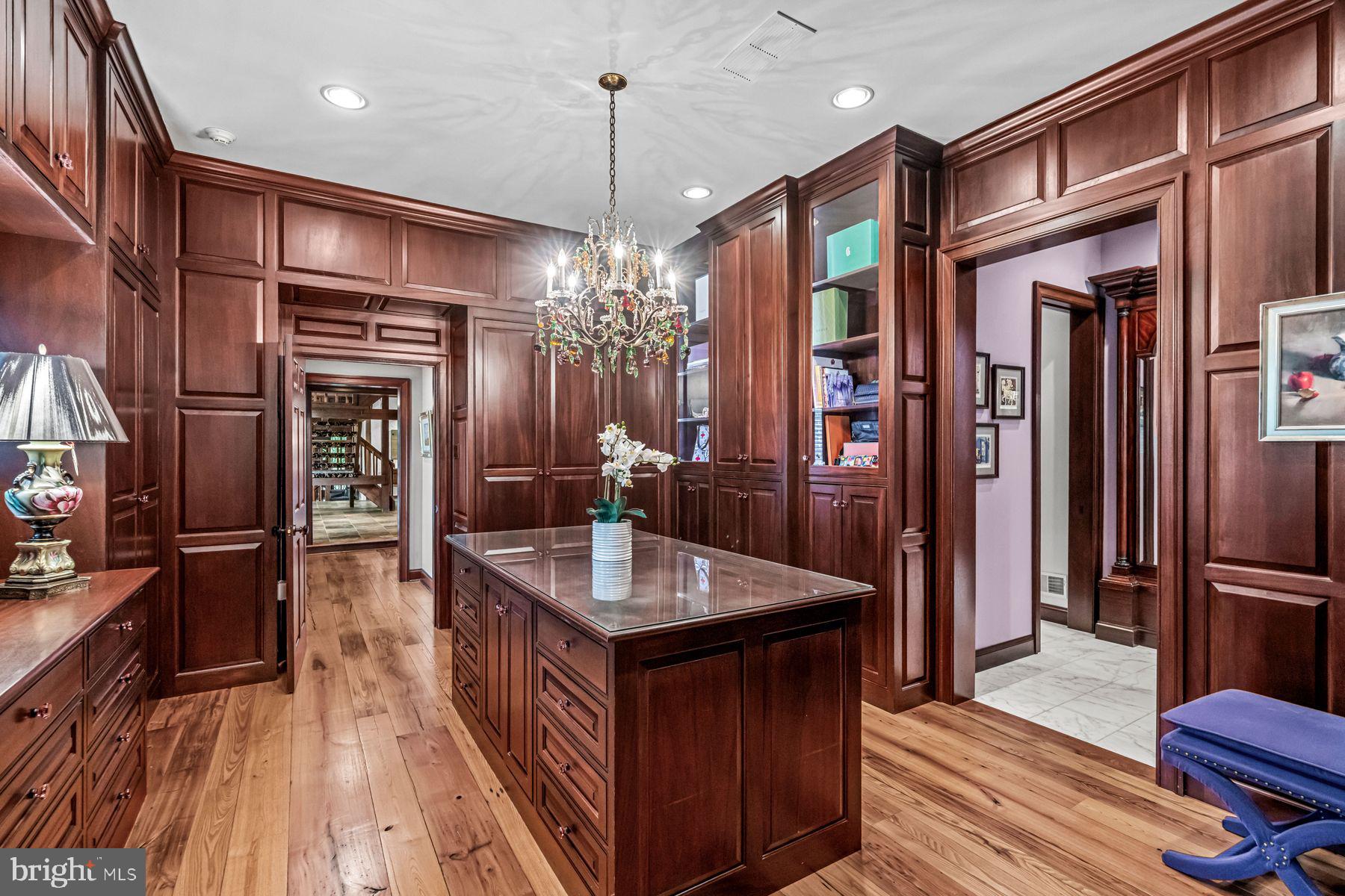 1408 Rene Road Villanova, PA 19085 - Photo 29 of 66 a kitchen with stainless steel appliances granite countertop a refrigerator a stove and a wooden floors