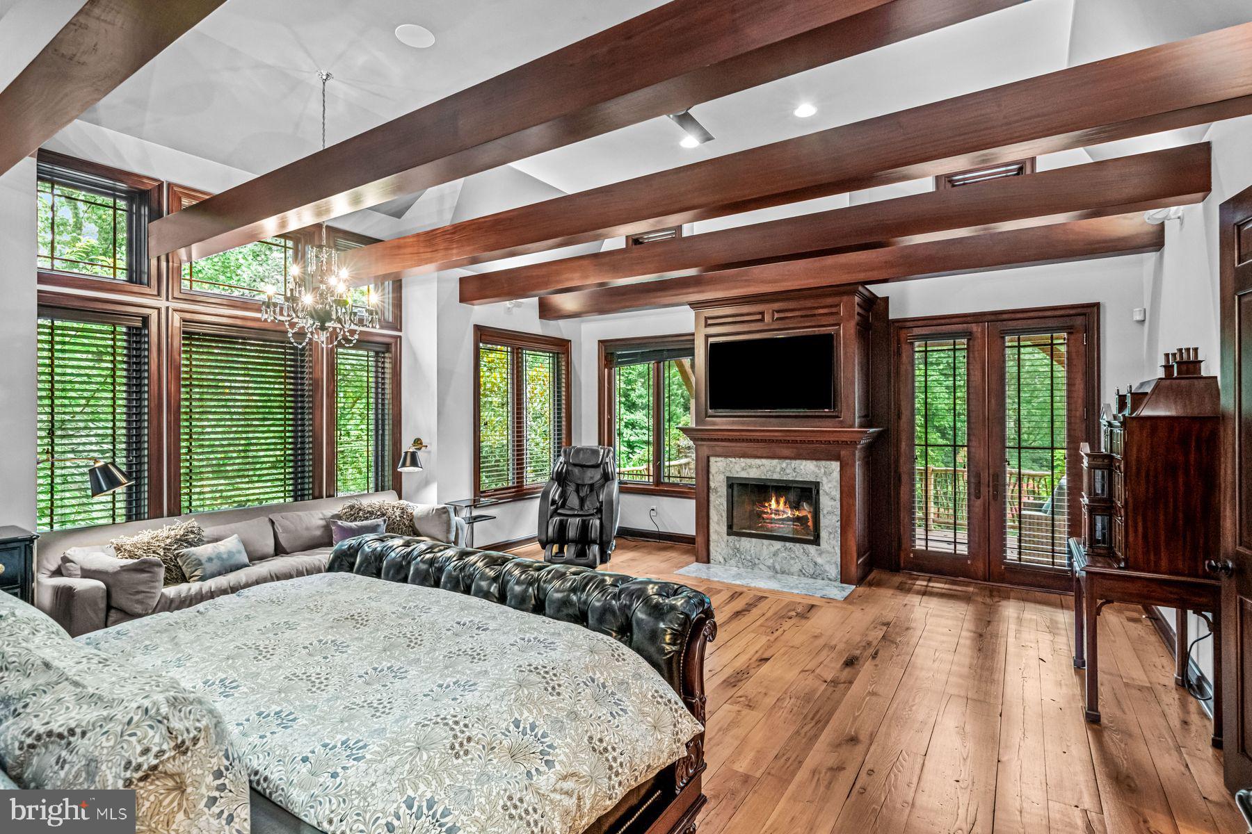 1408 Rene Road Villanova, PA 19085 - Photo 31 of 66 a living room with fireplace furniture and a large window
