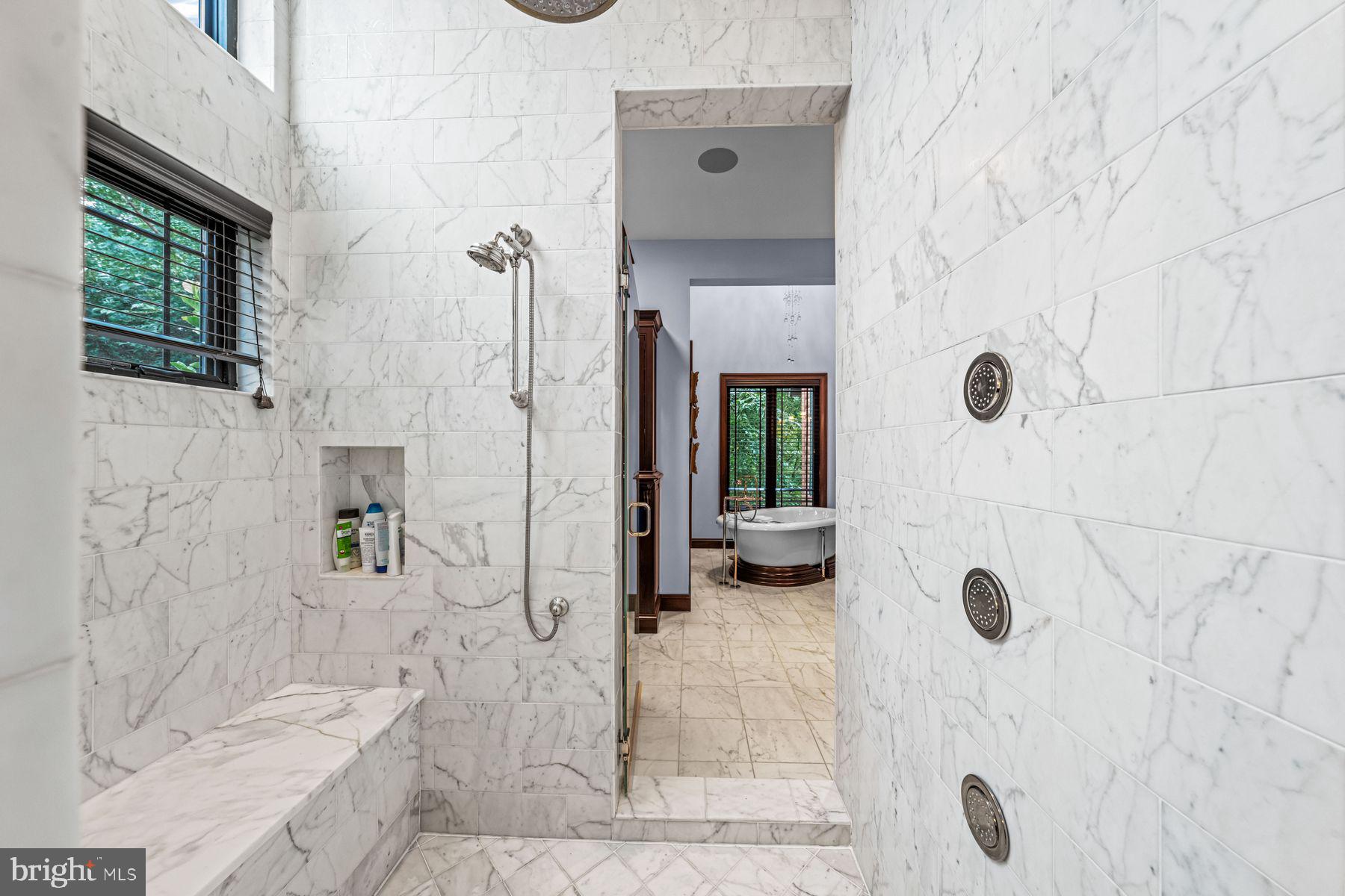 1408 Rene Road Villanova, PA 19085 - Photo 36 of 66 a bathroom with a granite countertop shower a sink and a shower