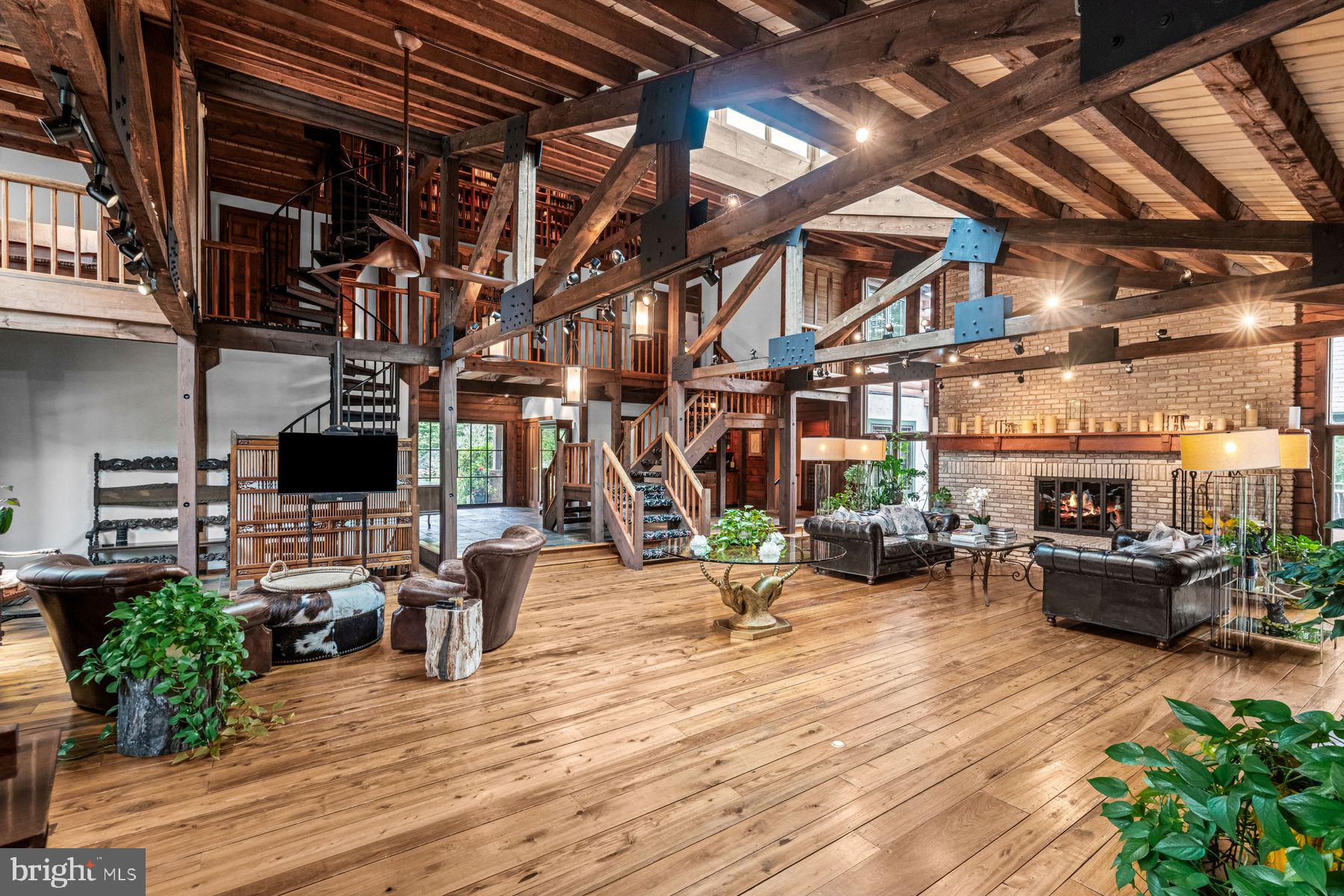 1408 Rene Road Villanova, PA 19085 - Photo 39 of 66 a living room with lots of furniture and flat screen tv