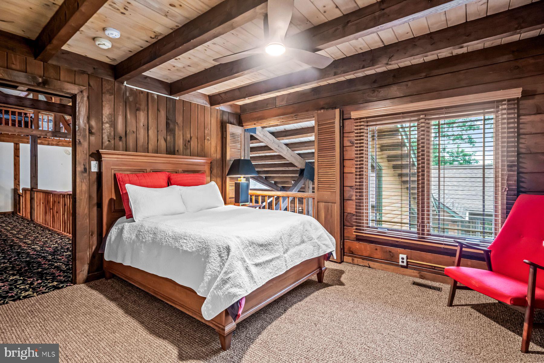 1408 Rene Road Villanova, PA 19085 - Photo 46 of 66 a bed room with a bed and a chair