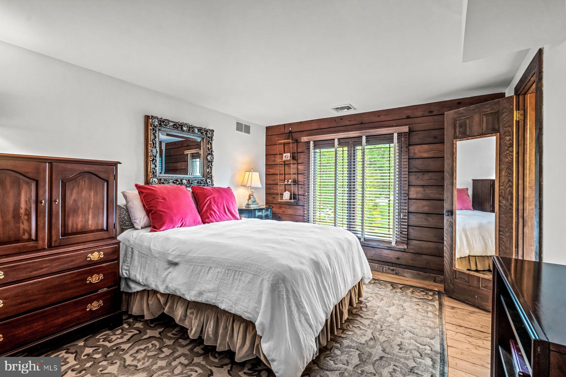 1408 Rene Road Villanova, PA 19085 - Photo 47 of 66 a bedroom with a large bed and a window