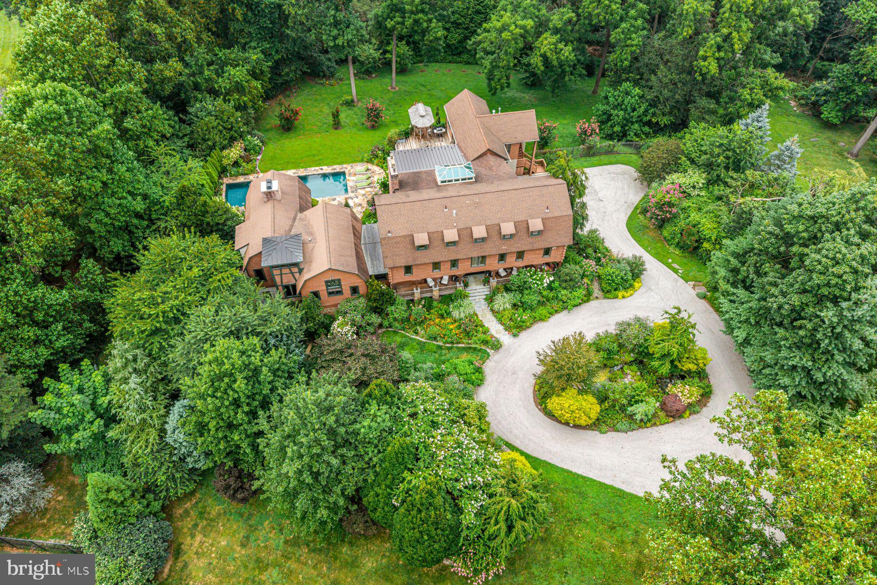 1408 Rene Road Villanova, PA 19085 - Photo 7 of 66 an aerial view of a house with garden space and street view