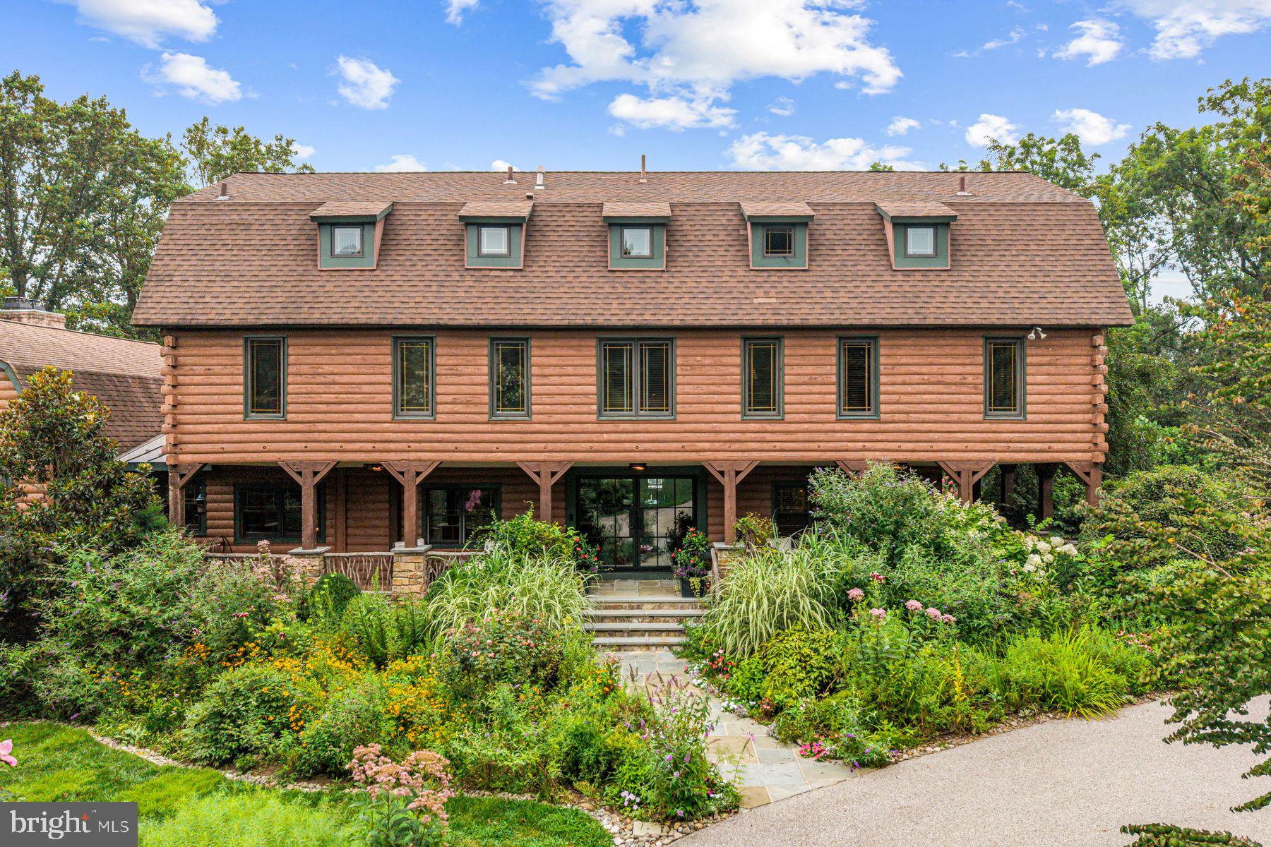 1408 Rene Road Villanova, PA 19085 - Photo 8 of 66 front view of a house with a yard