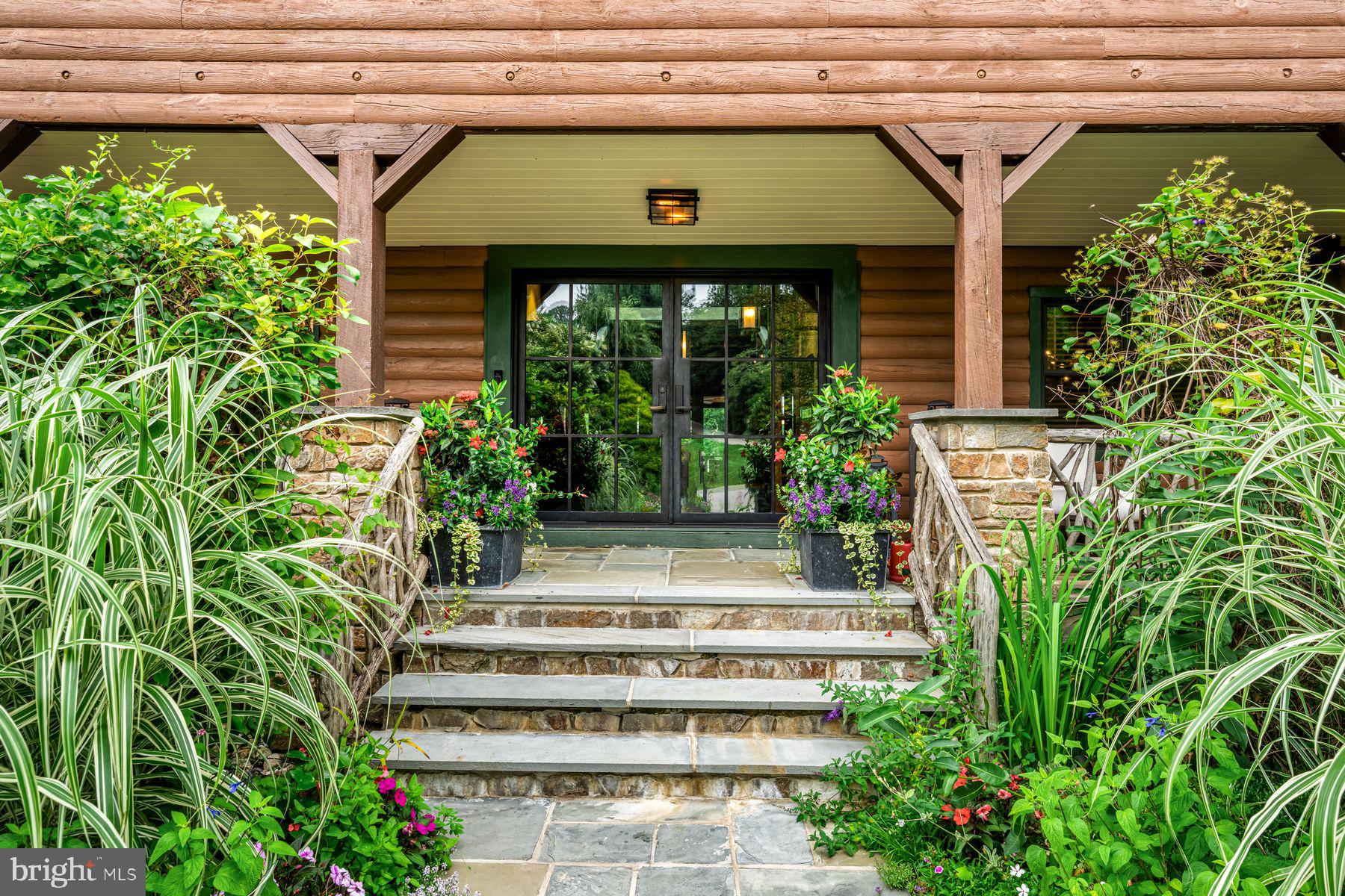 1408 Rene Road Villanova, PA 19085 - Photo 9 of 66 a front view of a house with plants