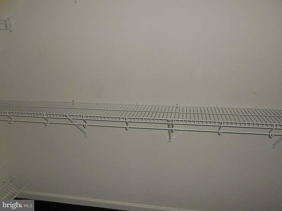 258 Cedar Ridge Drive Ruther Glen, VA 22546 - Photo 15 of 29 a view of a room with racks on the wall