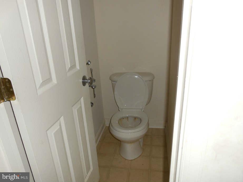 258 Cedar Ridge Drive Ruther Glen, VA 22546 - Photo 16 of 29 a bathroom with a toilet and a sink