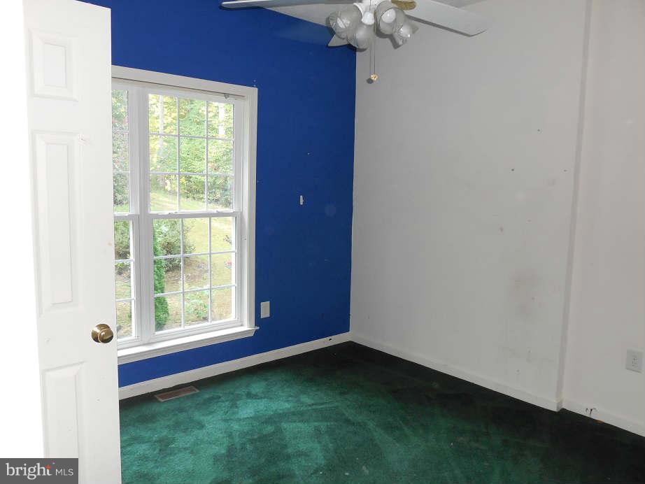 258 Cedar Ridge Drive Ruther Glen, VA 22546 - Photo 18 of 29 an empty room with a window