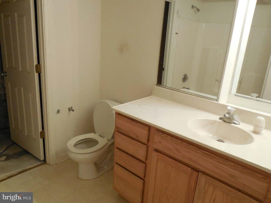 258 Cedar Ridge Drive Ruther Glen, VA 22546 - Photo 22 of 29 a bathroom with a sink and a toilet