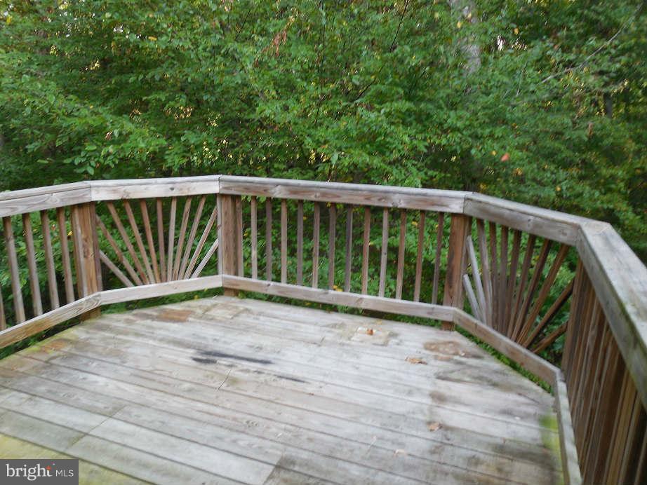 258 Cedar Ridge Drive Ruther Glen, VA 22546 - Photo 28 of 29 a view of balcony with wooden floor
