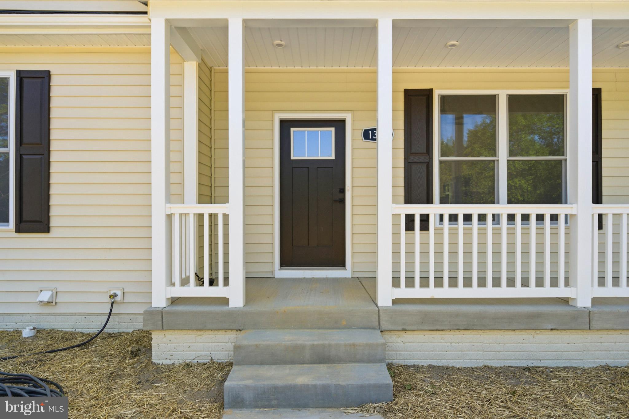 1362 Solomons Island Road Huntingtown, MD 20639 - Photo 3 of 37 front view of a house with a window