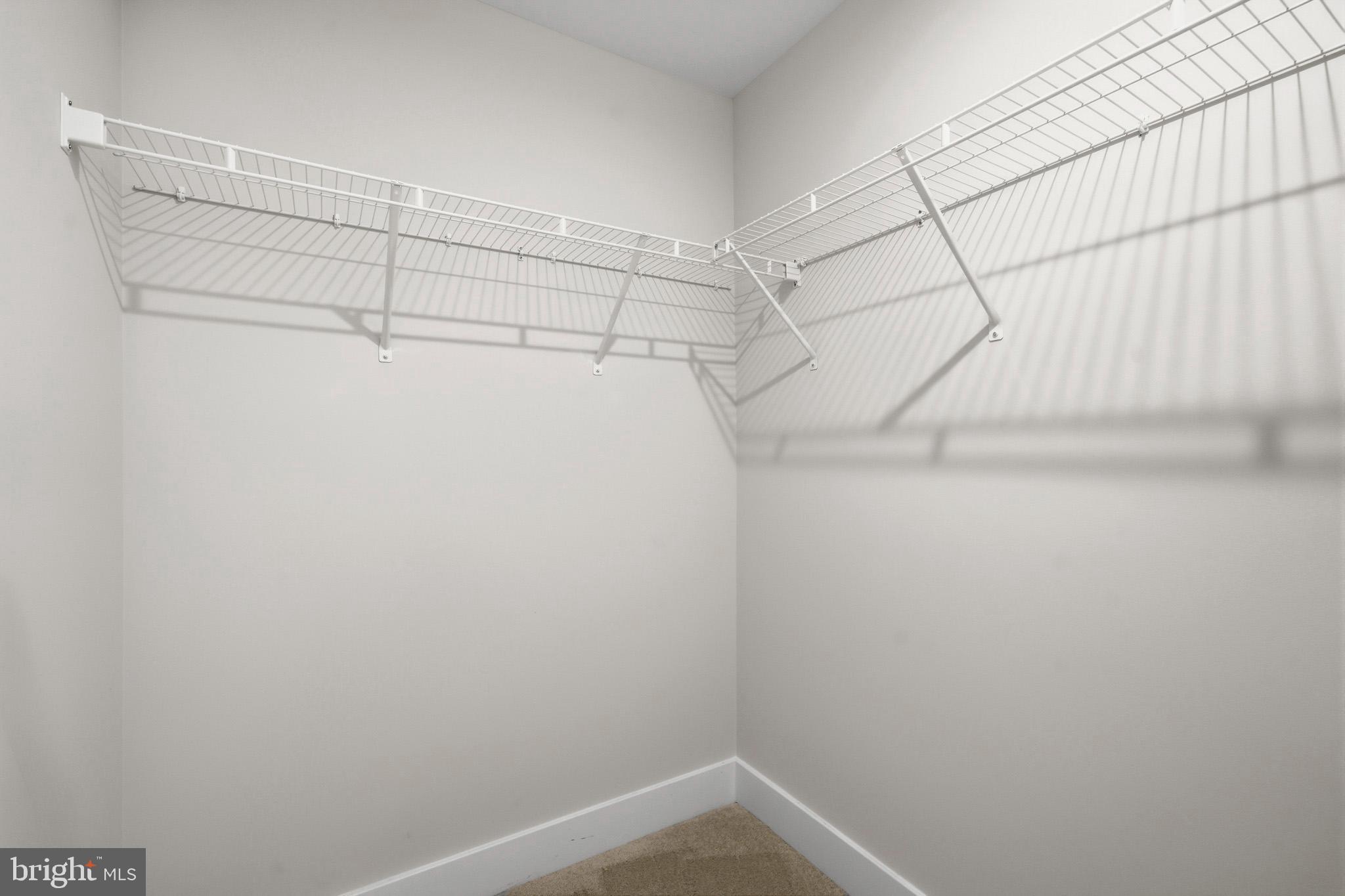 1362 Solomons Island Road Huntingtown, MD 20639 - Photo 36 of 37 a view of a room with racks on the wall