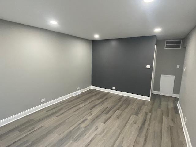 417 Hickory Street, Unit 1 Chicago Heights, IL 60411 - Photo 2 of 7 a view of room with wooden floor