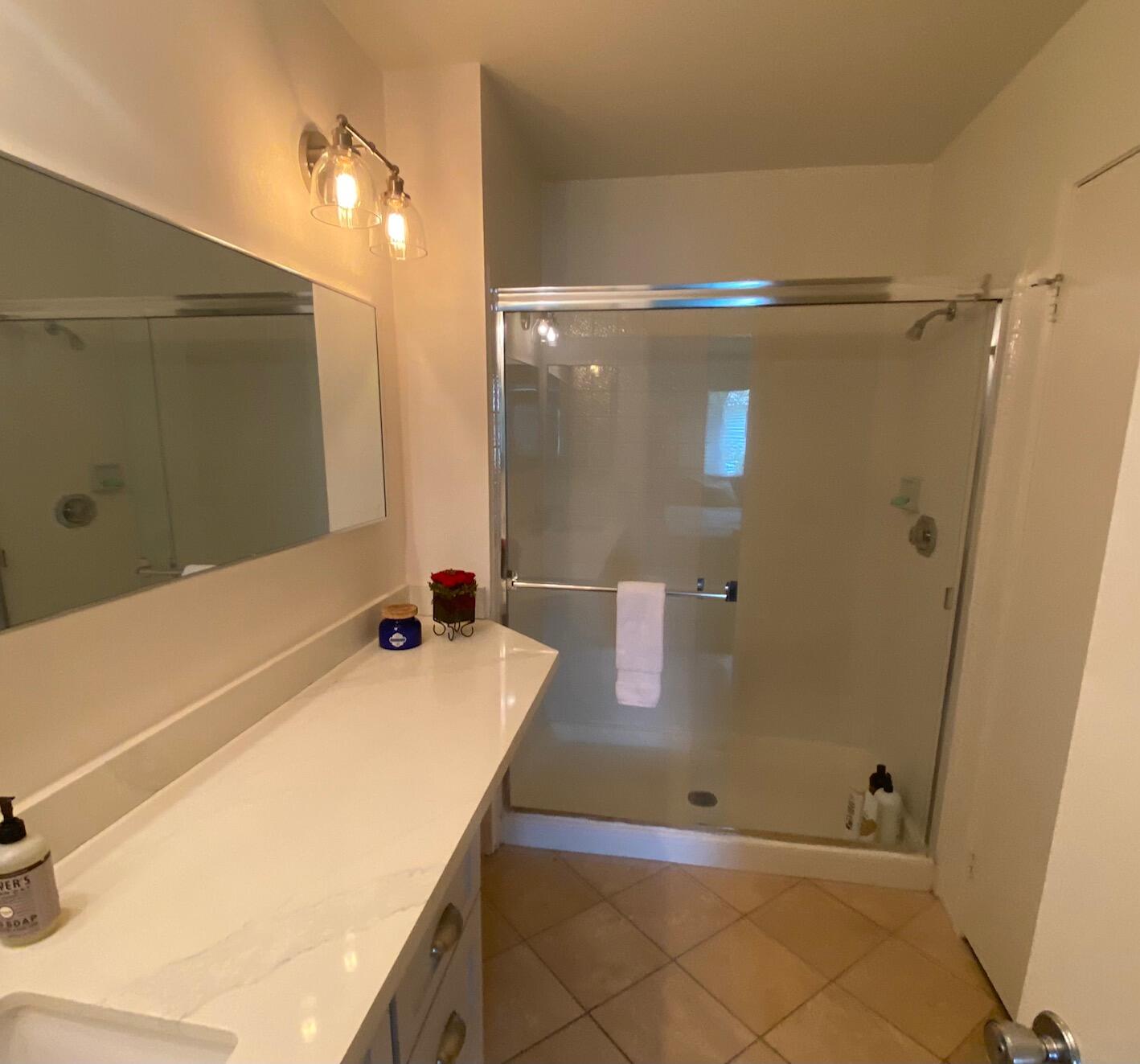 76131 Impatiens Circle Palm Desert, CA 92211 - Photo 13 of 27 a bathroom with a tub and a sink