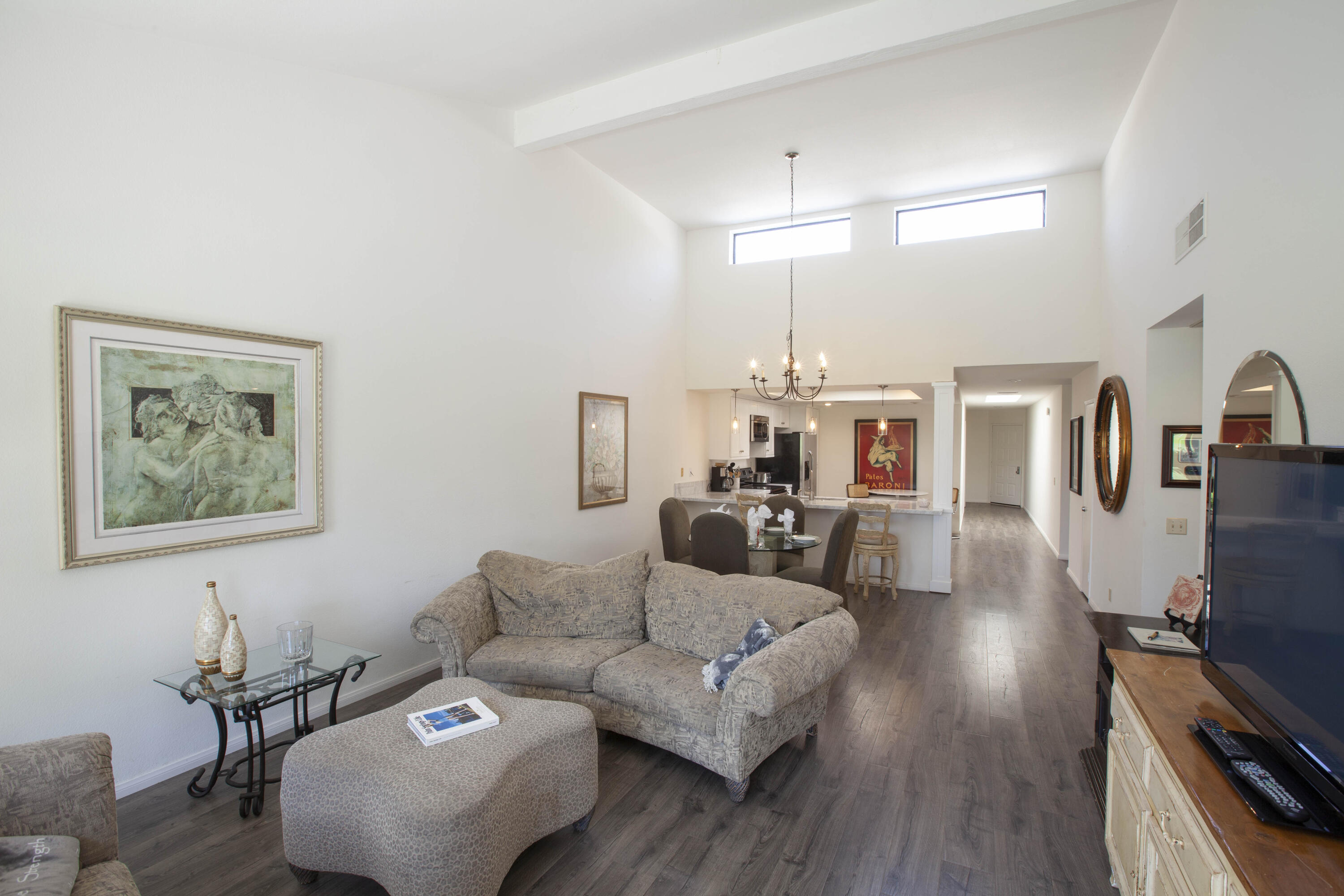 76131 Impatiens Circle Palm Desert, CA 92211 - Photo 5 of 27 a living room with furniture