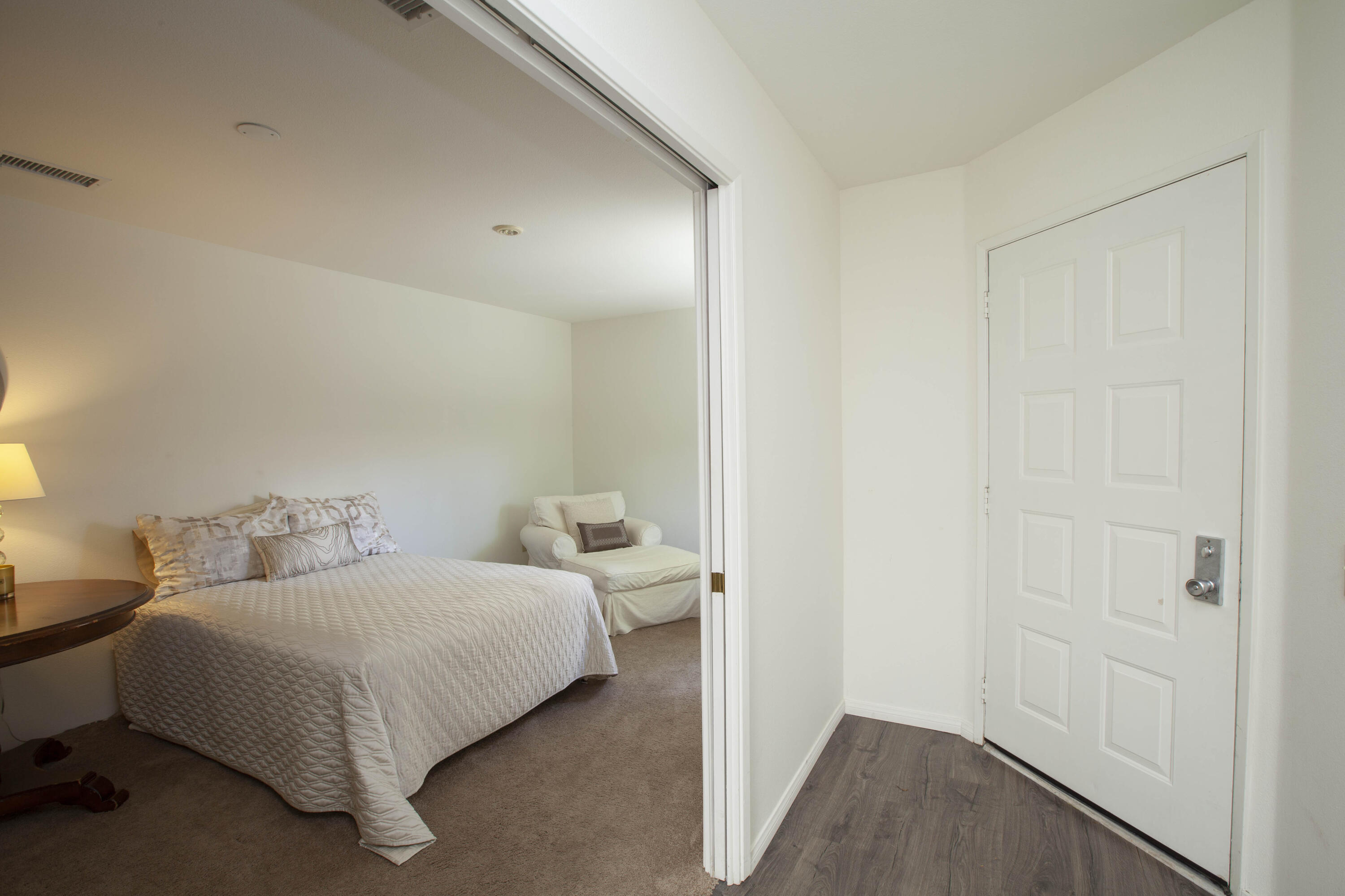 76131 Impatiens Circle Palm Desert, CA 92211 - Photo 10 of 27 a bedroom with bed and a window