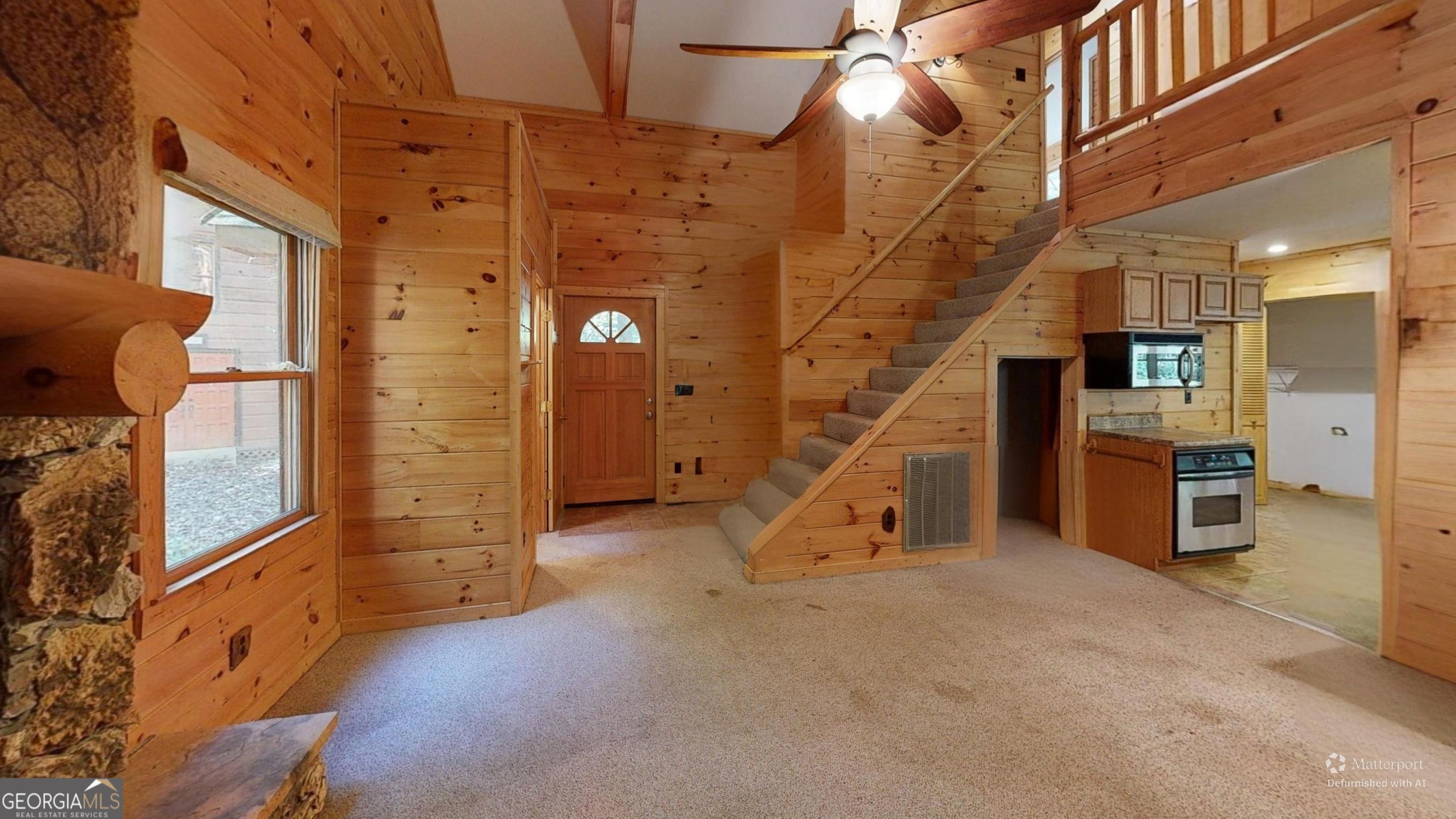 330 Pine Grove Drive Blue Ridge, GA 30513 - Photo 30 of 33 a view of an entryway with staircase