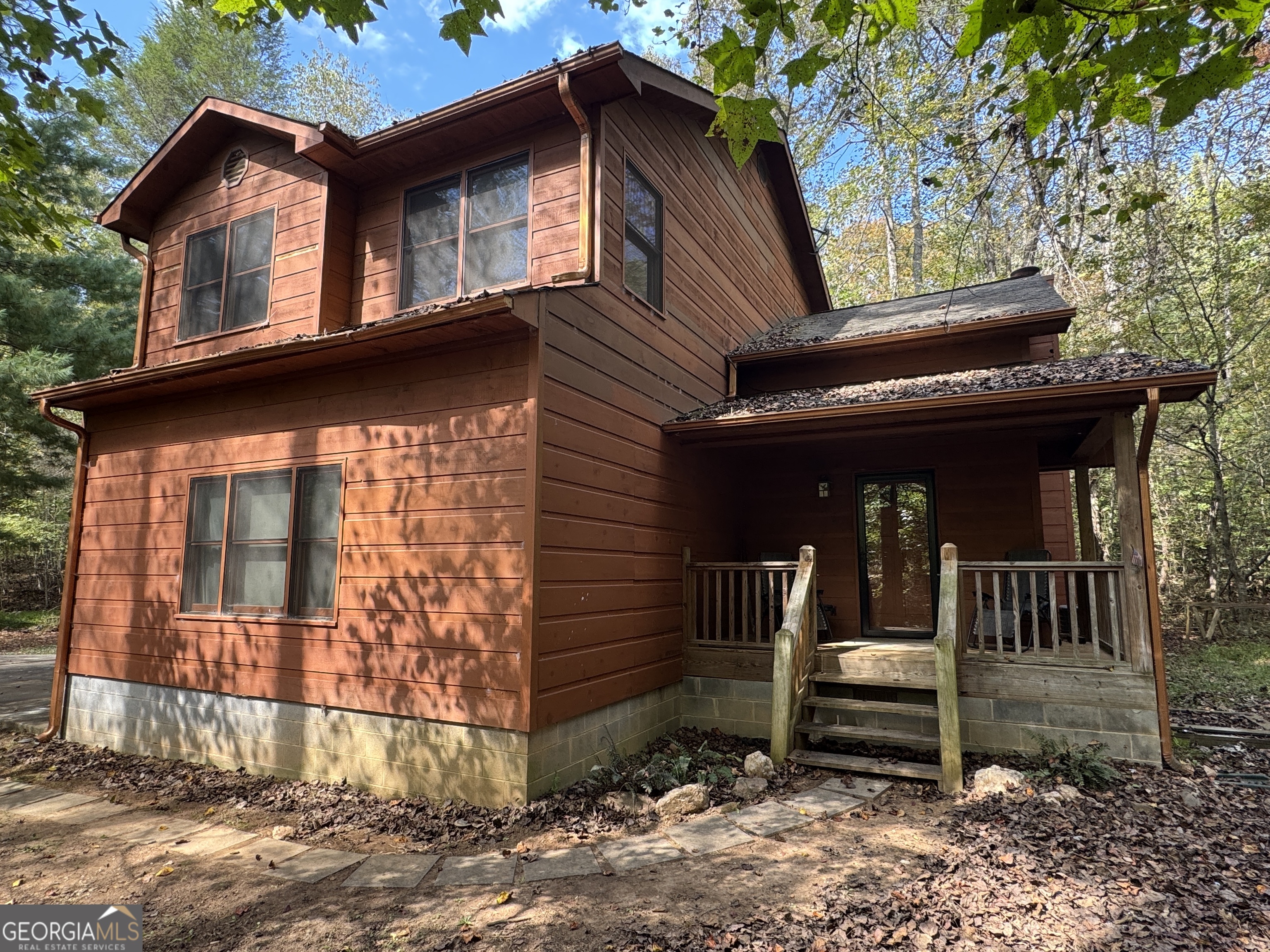 330 Pine Grove Drive Blue Ridge, GA 30513 - Photo 8 of 33 a front view of a house with garden