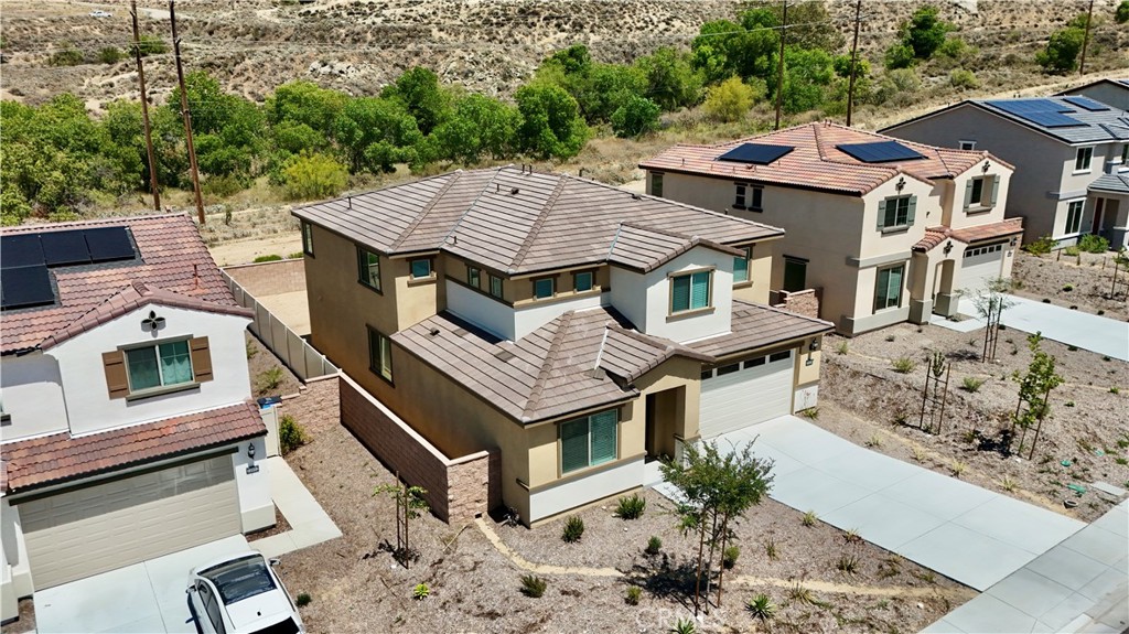 21624 Thomas Court Riverside, CA 92507 - Photo 3 of 36 an aerial view of a house with a yard
