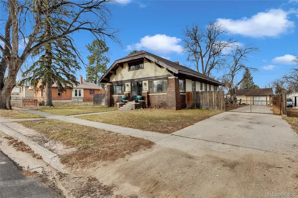 a view of road with large trees