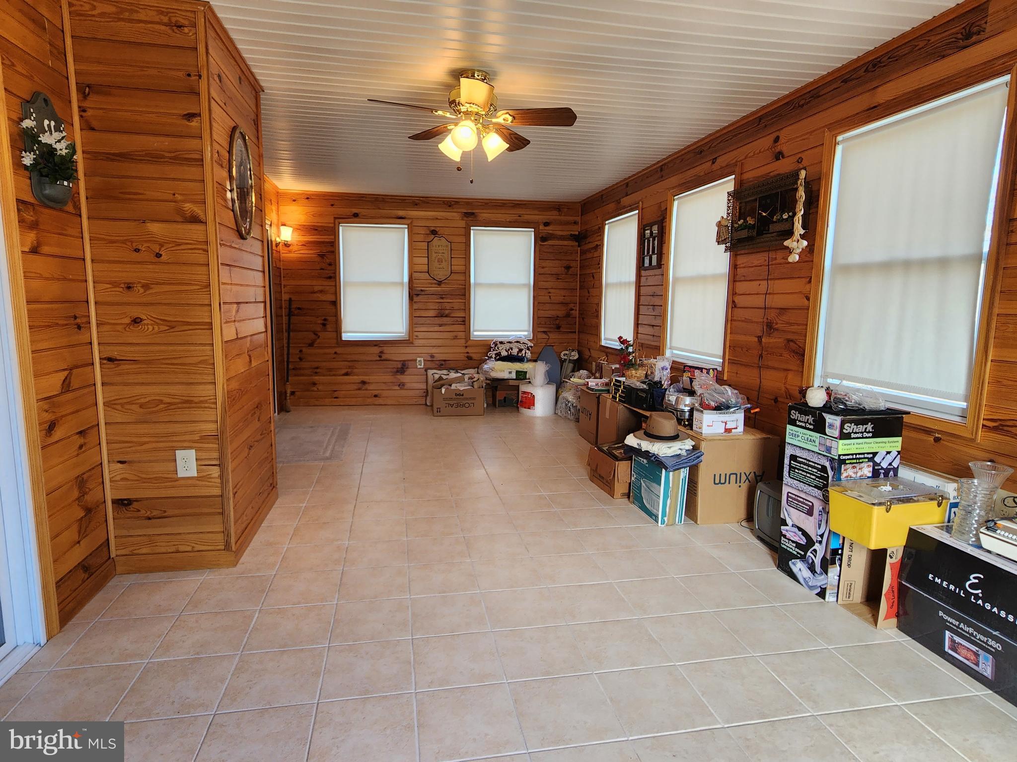 5290 Winchester Grade Road Berkeley Springs, WV 25411 - Photo 11 of 66 Side porch - off living room