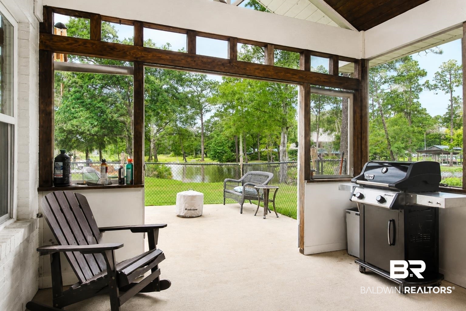 9825 Wolf Creek Ridge Elberta, AL 36530 - Photo 45 of 76 Covered outdoor patio featuring a concrete floor and a vaulted wood-finish ceiling
