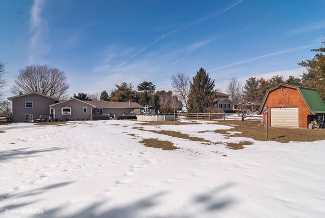 2S337 Dauberman Road Elburn, IL 60119 - Photo 18 of 20 a view of the house with snow on the road
