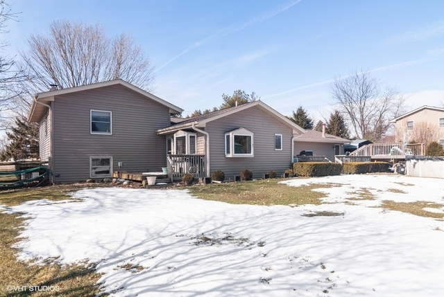 2S337 Dauberman Road Elburn, IL 60119 - Photo 19 of 20 a view of a house with snow on the road