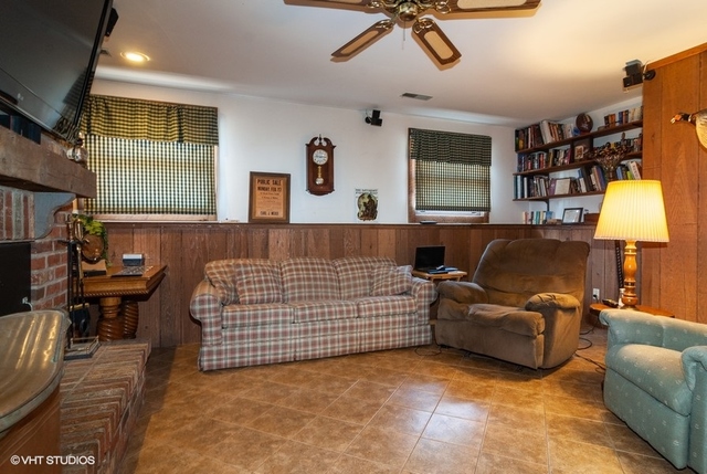 2S337 Dauberman Road Elburn, IL 60119 - Photo 9 of 20 a bedroom with a bed couch and a window