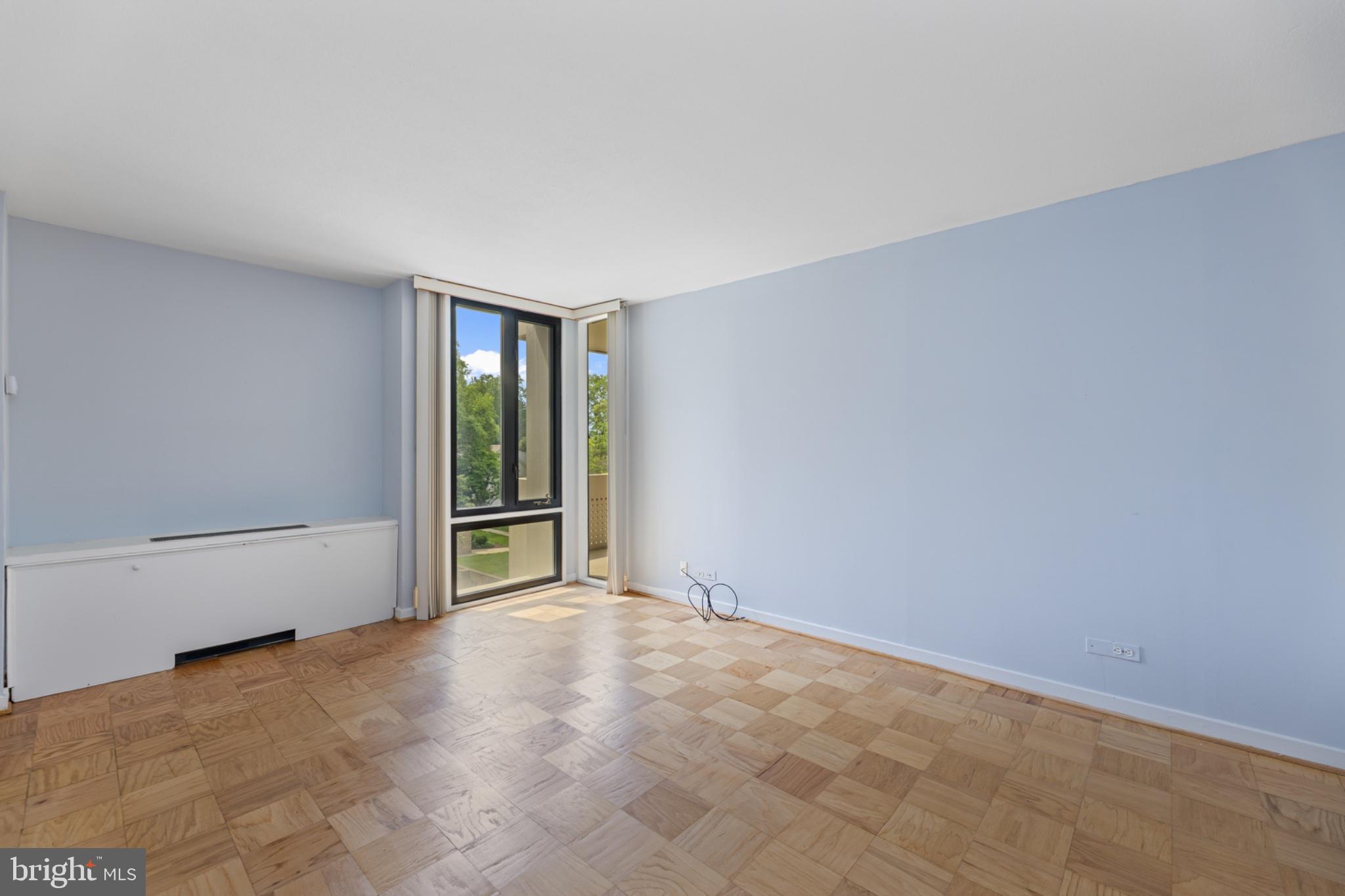 490 M Street Southwest, Unit W101 Washington, DC 20024 - Photo 14 of 26 an empty room with windows