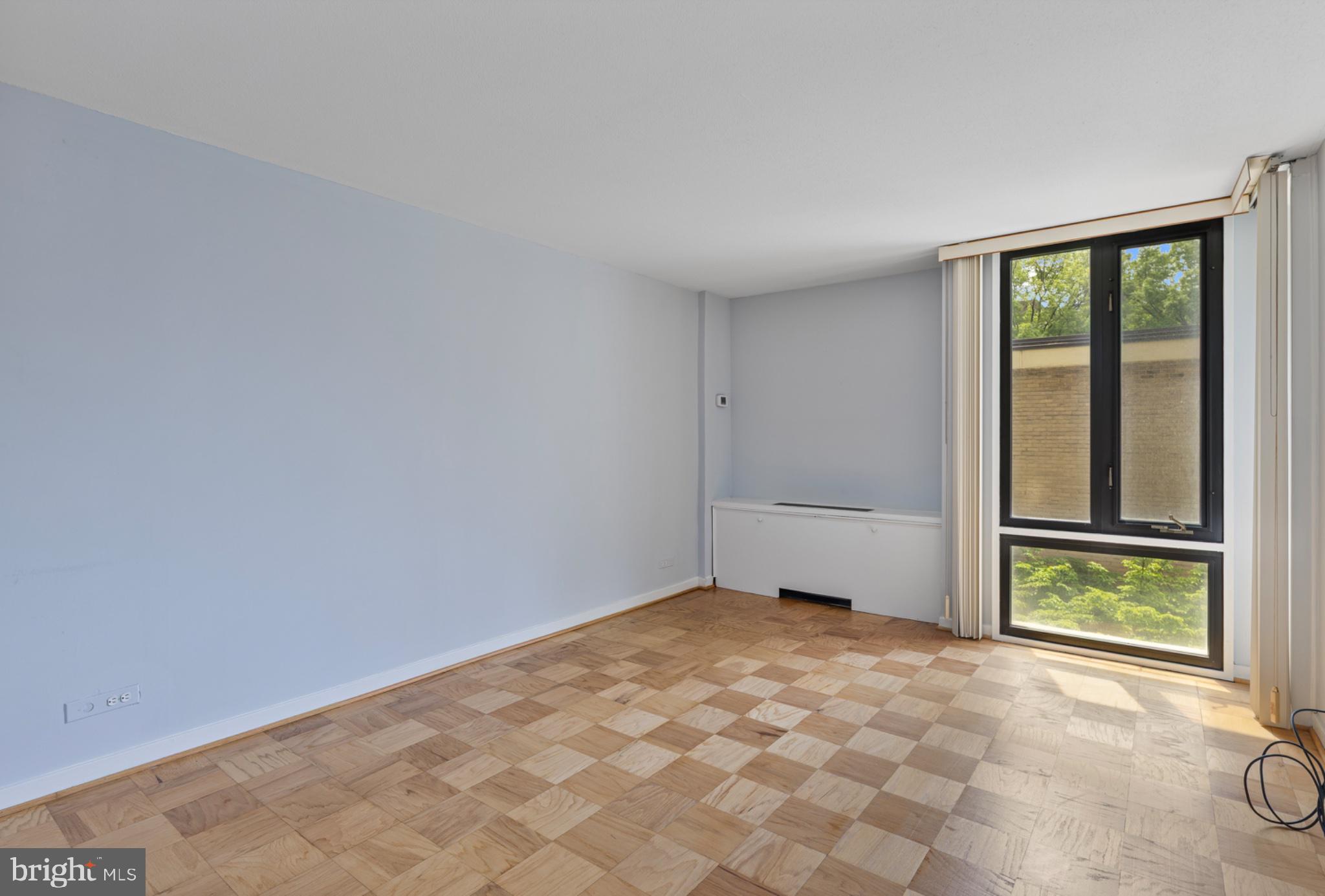 490 M Street Southwest, Unit W101 Washington, DC 20024 - Photo 15 of 26 a view of an empty room and window
