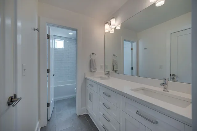 a room with a bed and a window