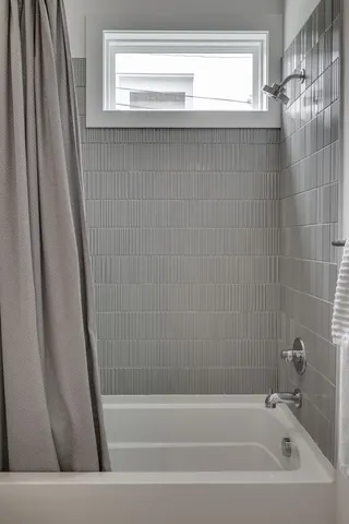 a bathroom with a bathtub