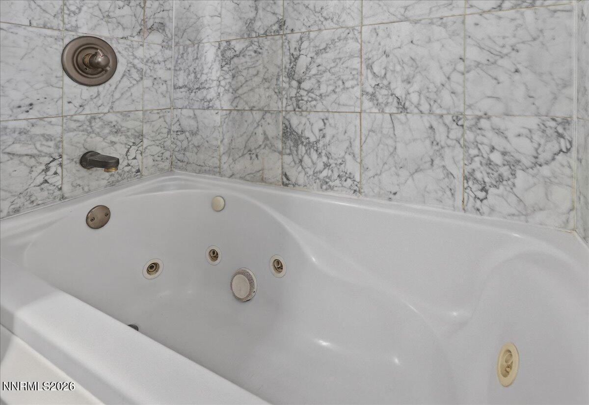 1777 Howard Court Sparks, NV 89434 - Photo 16 of 32 a bathroom with a tub